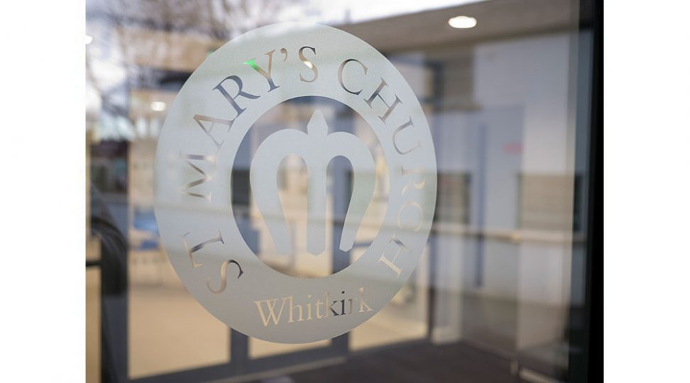 etched glass signage for a church logo