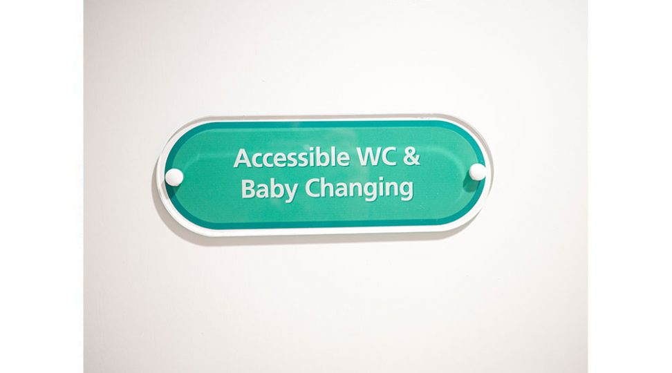 accessible WC an baby changing signage